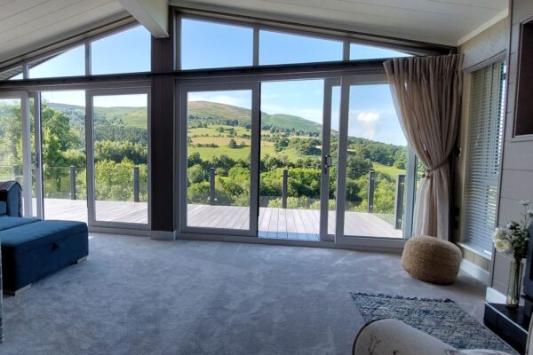 A room with a view | Luxury Lodge for sale with stunning countryside views looking across lakes, woodland and the Clwydian Hills | North Wales