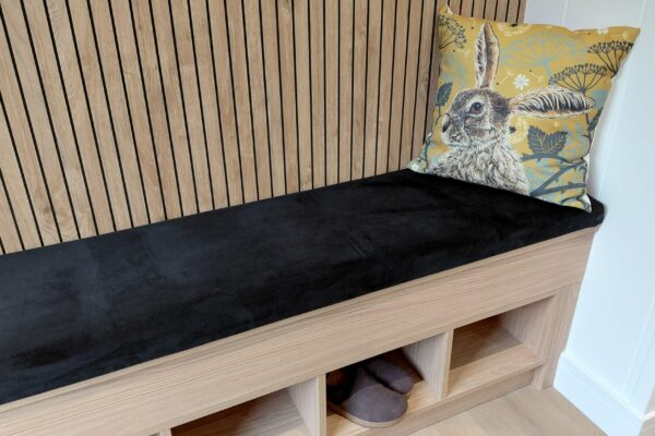 Entrance hallway with built-in boot storage in bespoke Solhare Lodge for sale on Maes Mynan Park, manufactured by YourRetreats