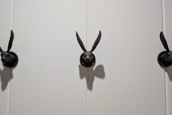 Utility room with stacking washing machine and separate dryer in Solhare Lodge for sale on Maes Mynan Park, North Wales | Manufactured by YourRetreats