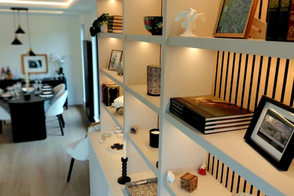 Built-in shelving with wood panelling in bespoke lodge for sale | Maes Mynan Park in North Wales | YourRetreats