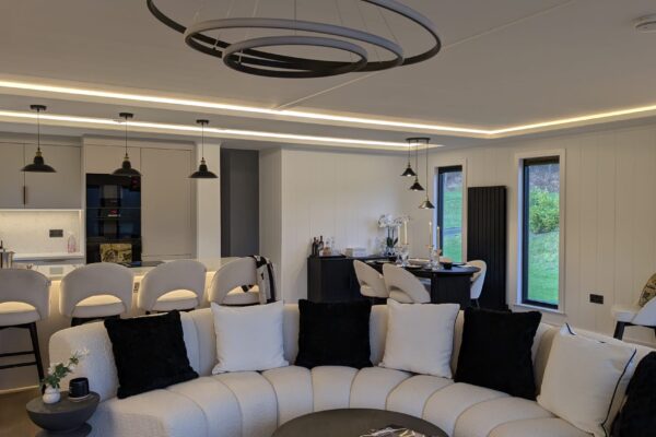 Open-plan lounge in luxury lodge for sale North Wales