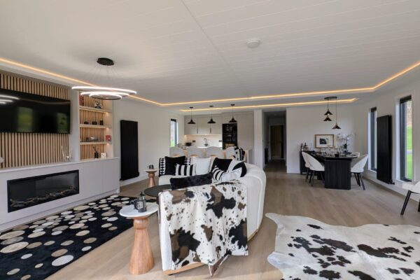 Solhare Lodge open plan lounge kitchen and dining room - Maes Mynan Park - YourRetreats