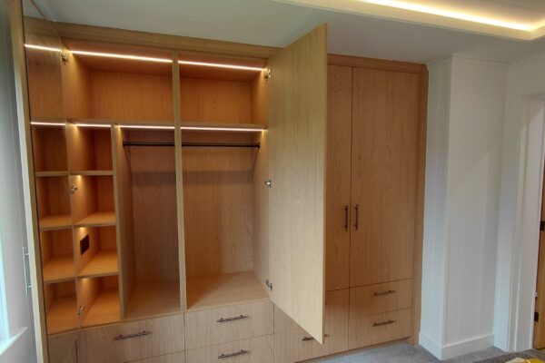 Spacious wardrobe storage in guest room with LED lighting | Luxury Lodge for sale by YourRetreats at Maes Mynan Park in North Wales